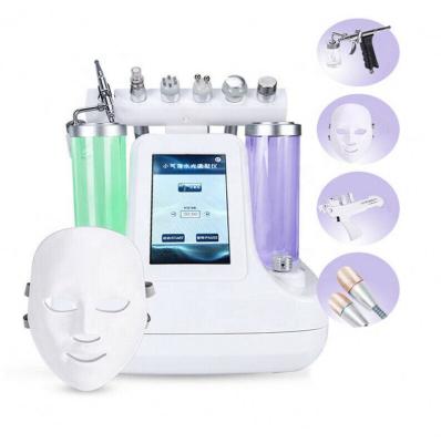 China Portable Exfoliators 9 In 1 Water Dermabrasion Hydra Spray Peeling Machine With Facial Mask for sale