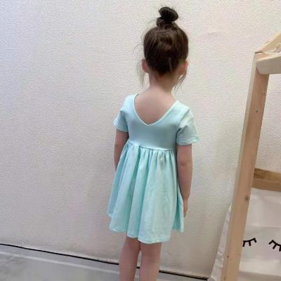 China Solid Color Anti-wrinkle Popular Seamless Round Neck Front Pocket Cotton Dresses For Girls for sale