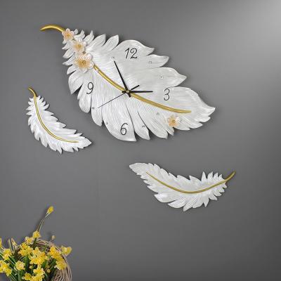 China Classy Wall Decoration Resin White Feather 3d Fashionable Wall Clock Set For Home Decoration for sale