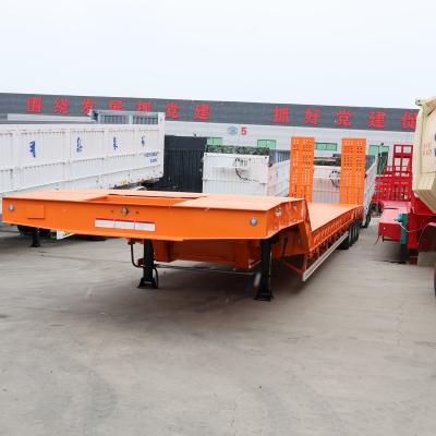 China 12 Tyres Low Bed Truck Semi Trailer for Excavator Transport Hydraulic Ramp for sale