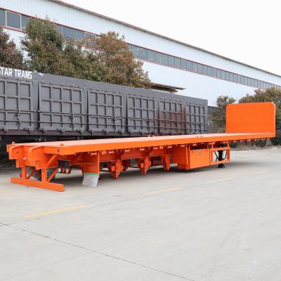 China 50 Ton Heavy Duty Lowbed Lowboy Semi Trailer with Ramp 3 Axis Wabco Braking Valve for sale