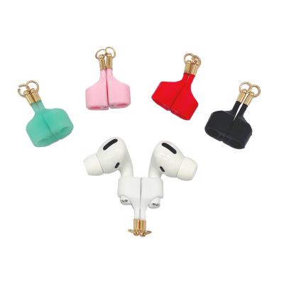 China Classic Wholesale Magnetic Earphone Holder Silicone Anti Lost Hanger For Airpods FreeBuds for sale