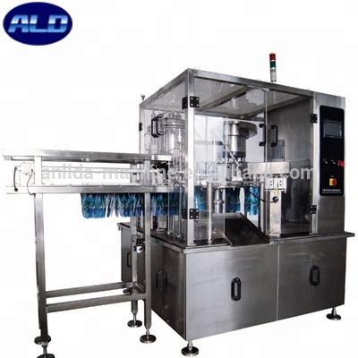 China Automatic Beverage ZGY-2000 POS Liquid Spout Ladle Filling Capping Machine for sale