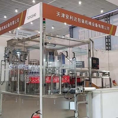 China Automatic Blue Beak Pouch Water Cleaning Moisturizer Clay Food Cosmetic Filling Capping Machine for sale