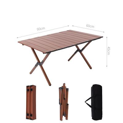 China Wood Grain Outdoor Folding Portable Folding Table Aluminum Alloy Picnic Egg Roll Table Camping Table Solid Wood for sale