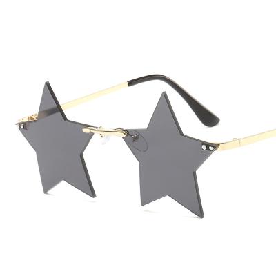 China Unique Cute Fashion Women Vintage Rimless Star Shaped Metal Rimless Sunglasses Beautiful for sale