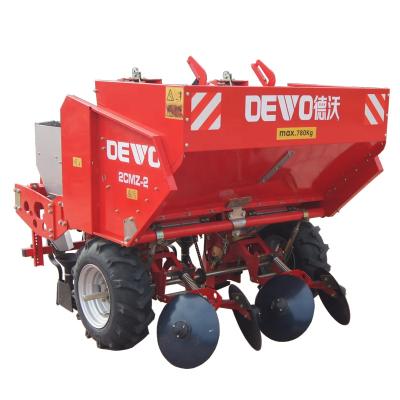 China Adopt 2CMZ-2 potato planter independent multifunctional three-point linkage double row potato planter structure fertilization with fertilizer for sale