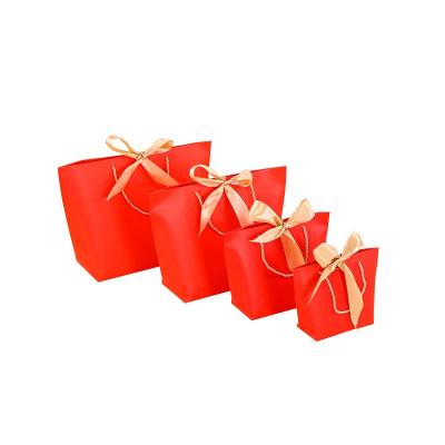 China Recycled Materials Wholesale Customize Red Paper Sack Bags With Rope Handle for sale