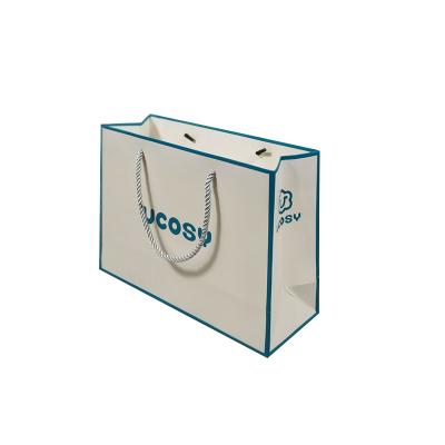 China Recycled Materials Custom Shopping Paper Bag With Logo for sale