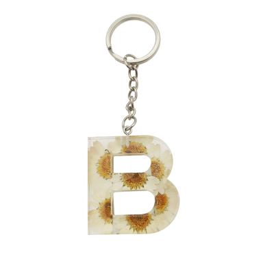 China Key Ring Dried Flower Keychain, Daisy Resin Letter Dry Diy Flowers Real Resin Keychains for Resin Keychains for sale