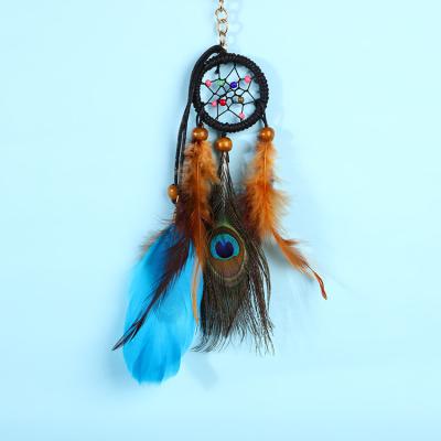 China Indian Natural Key Chain Peacock Pendant Dream Catcher for sale