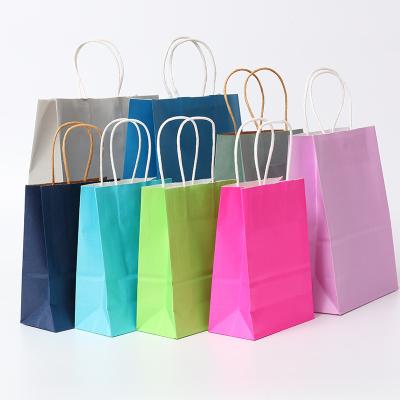 China Wholesale Recycled Brown Paper Bags Recyclable Stain Clothing Shoe Gift Shopping Bags Food Kraft Paper Package Custom Logo With Handles for sale