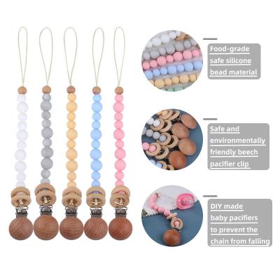 China 100% Custom Wholesale Eco-Friendly Wooden Baby Teethers Soothe Dummy Pacifier Silicone Baby Pacifier Clip for sale