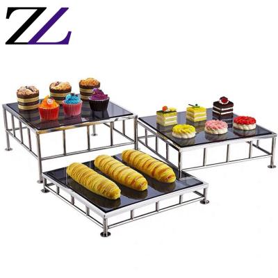 China Durable and modern decorative glass square cake buffet equipment dessert buffet riser display stand glass display stand for banquet for sale