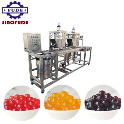 China JUMPING BOBA BALL/POPPING BOBA MACHINE Small mini double lab KONJAC head and konjac balls depositor making machines for freezing balls forming equipment for sale