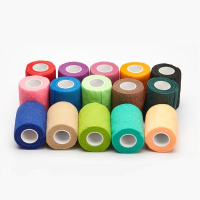 China Hot Selling Flexibility Sports Pad Colorful Elastic Crepe Self Adhesive Bandage With Medical Gauze for sale