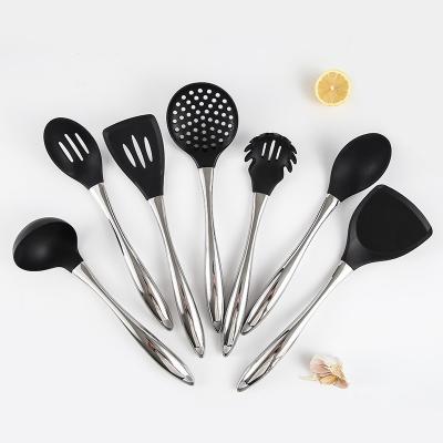 China Latest Design Cheap Hollow Handle Silicone Head Cooker Set 7 Piece Set Kitchenware for sale