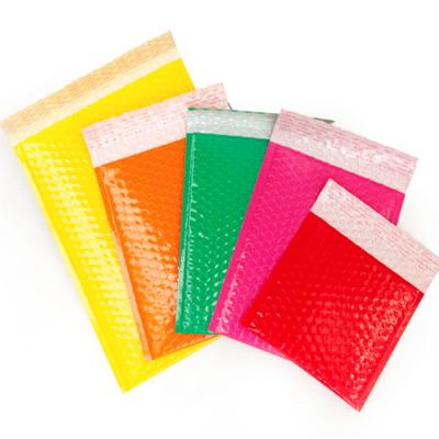 China Shock Resistance Air Padded Bubble Mailers Shipping Mailing Bags Poly Bubble Envelope In Pink Green Yellow Red Color for sale