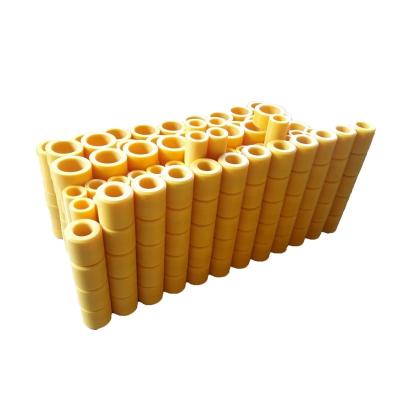 China Building Material Shops Polymeric HDPE Belt Conveyor Idler CNC Machined UHMWPE Roller For Port Crane PE Roller for sale