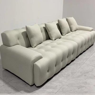 China Contemporary Cloud Factory Made Sectional Flower Shape Button Upholstered Fabric Hotel Sofa For Project for sale