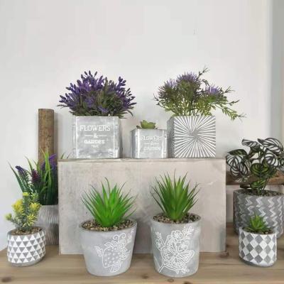 China Hand Made Wholesale Garden Decoration Concrete Planters With Artificial Flower for sale