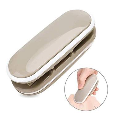 China Mini Heat Sealing Machine for Kitchen Portable Plastic Bags Vacuum Sealing and Improved for sale