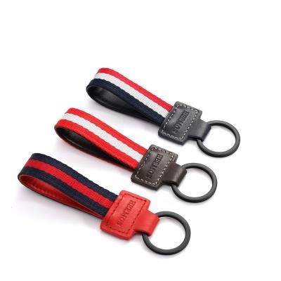 China Promotional high quality metal car keychains fashion metal leather keychains with metal key ring for gifts for sale