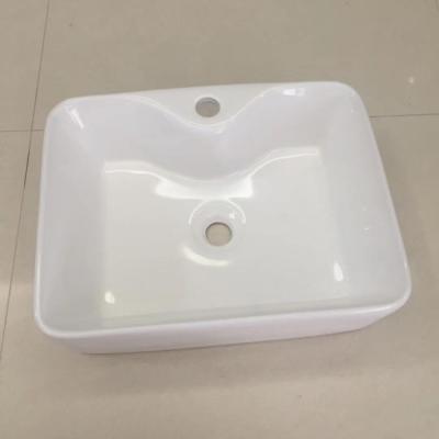 China Modern Bathroom Sanitary Ware 8025 Rectangular White Porcelain Table Top Sink Art Basin for sale