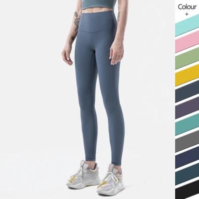 China Breathable Ladies Solid Color PLUS Sportswear Pants High Waisted Yoga Pants Women Soft Nylon Spandex Fitted Running Gym Leggings for sale