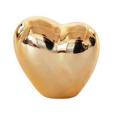 China Art Decor Golden Heart Ring Holder Storage for Jewelry Engagement Wedding Ring Display Holder Stand Trinket Trays for sale