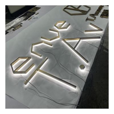 China Custom energy saving metal commercial store logo wall gold signboard front sign led 3 d letters with back light for sale