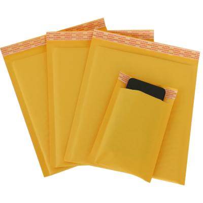 China Custom Logo Mailing Shipping Bag Kraft Paper Packaging Bubble Envelopes Delivery Packing Pouch for sale