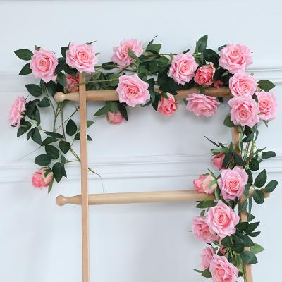 China Rose Rattan Wall Hanging Fake Flower Natural Rattan Wedding Photography Touch Ceiling Winding Pipe Window Decoration for sale