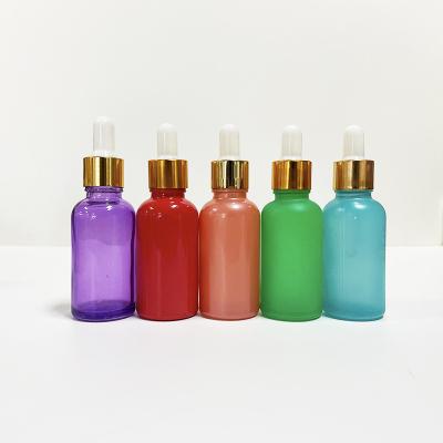 China Hot sale 20ml 50ml 100ml personal care cosmetic gel silk screen silk screen dropper paint glass bottle for essential oils for sale