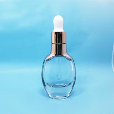 China 30ml 50ml 60ml Single Cosmetic Empty Eye Cosmetic Serum Cream Glass Bottles With Gold NBR Bulb Dropper for sale