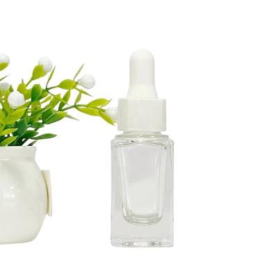 China Wholesale Thick Oil Serum Bottle Square Clear Luxury Cosmetic Packaging 10ml Glass Bottles With Dropper for sale