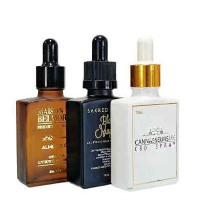 China High end clear pink glass srectangle serum dropper bottle 30ml 50ml personal care square dropper bottle for cosmetic essential oil for sale