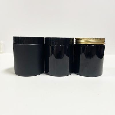 China Hot Selling PET Hair Pomade Plastic Containers Round Cap Eco-friendly Gold Cosmetic Jar 500ml Black Jar for sale