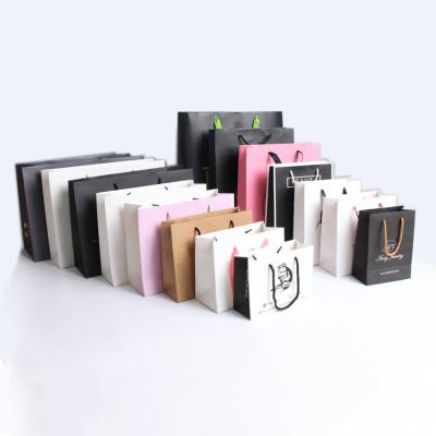 China Recyclable Gift Paper Bag Custom Printed Luxury Retail Paper Shopping Bag With Handle For Clothing for sale