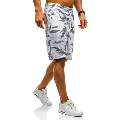 China Anti-wrinkle Summer Fitness Quick Shorts Beach Streetwear Men Drawstring Camouflage Printing Loose Casual Shorts Splicing Half Pants for sale