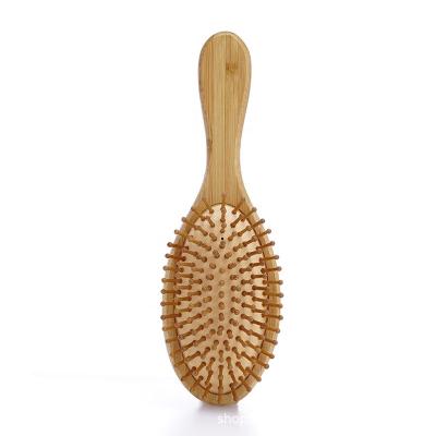 China Bamboo Paddle Airbag Massage Comb Carbonized Solid Wooden Cushion Hair Brush Anti-static Hair Combs for sale