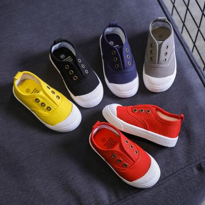 China Kids Fashion To Colored Flat Tied Canvas Shoes 21-25/26-30/31-35 for sale