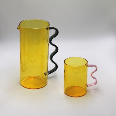 China Food Grade Water Sustainable Handmade Colored Heat Resistant Glass Pitcher for sale