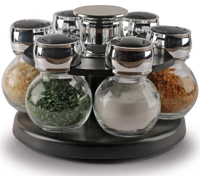 China Sustainable 6 Bottles Rotating Glass Spice Rack Set With PP Rack for sale