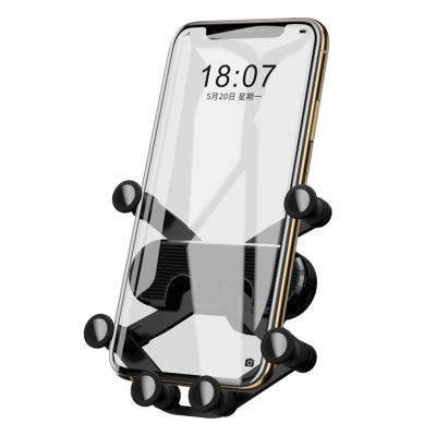 China Universal Flexible Soft Pad Mobile Phone Car Shockproof Holder with Car Memory Lock Holder Car Mount for sale