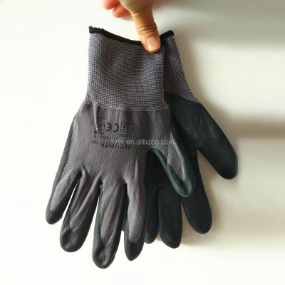 China Breathable 15g nylon and spandex liner dipped foam micro nitrile gloves for sale