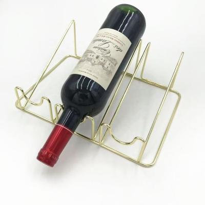 China Modern Fancy Electroplate Gold Wine Rack Table Top Wine Rack Metal Wire Wine Rack for sale