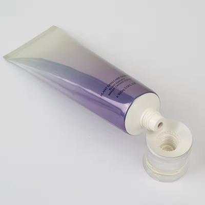 China Aluminum Eye Oil Tube Glossy Eye Cream Tube 2 In 1 With Screw Cap for sale