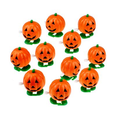 China Playing Halloween Pumpkin Wind Toys Children Plastic Cogs Walking Toy for sale