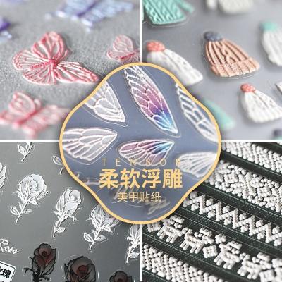 China Extremely Shiny Paso Sico 31 Designs Angel Lace Wing Flowers Rose Cherry Butterfly Bow 5D Emboss Nail Art Trend Stickers For Adhesive Manicure for sale